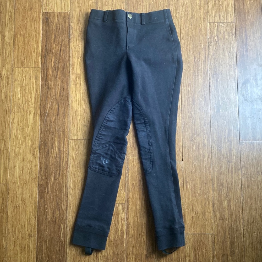 Gil’s black Tuffrider jodhpurs